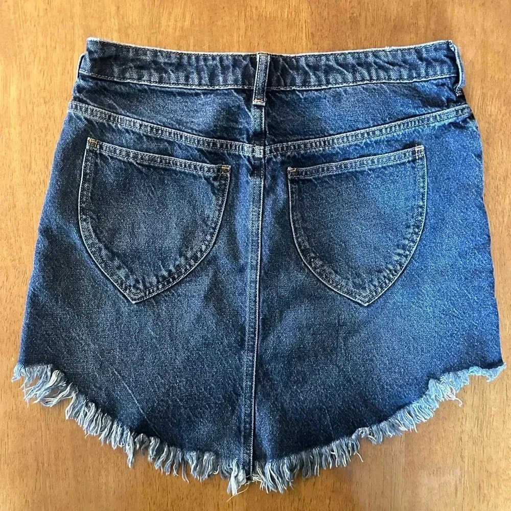 Free People We The Free Bailey Fringe Denim Mini Skirt. - Picture 3 of 10